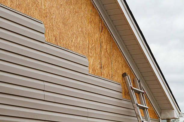 Professional Siding Repair technician working in Laughlintown, PA
